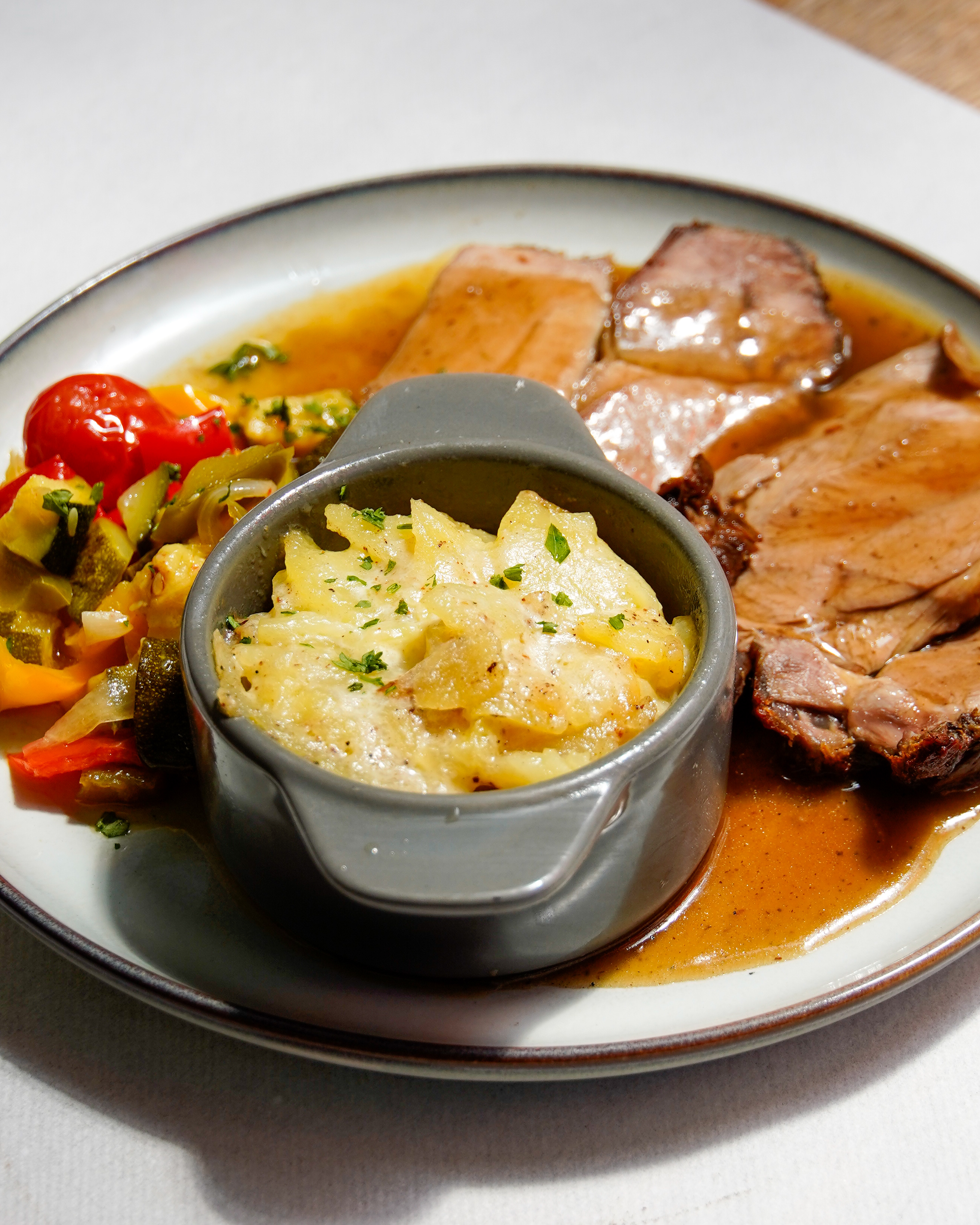 Signature duck dish with roasted vegetables and creamy potato